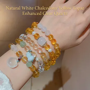 Hand beaded white chalcedony and citrine bracelet with jade rabbit and gourd charms