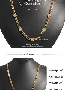 Macro detail of 5mm gold curb chain necklace with five round cubic zirconia stones