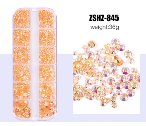 Detail of 12-slot storage box with orange-gold iridescent flatback resin rhinestones
