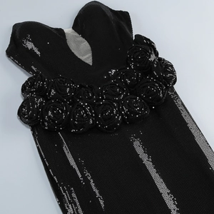 Elegant black sequin mermaid dress with deep V-neck and 3D floral accents for parties