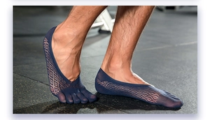 Detail view of men's low cut five-toe socks in breathable dark blue mesh material