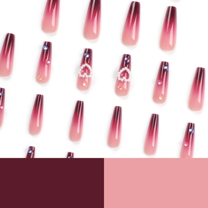 Long coffin gradient nails in burgundy and pink with heart pearls and colorful rhinestones