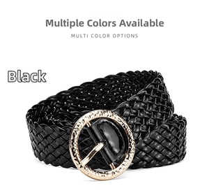 Close-up of black woven belt featuring a textured gold-tone round metal buckle detail