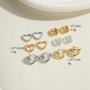 Minimalist heart and twisted hoop earrings set in gold and silver finish with dimensions