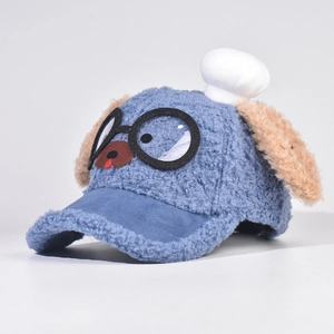 Detail of blue fleece kids baseball cap featuring puppy ears and mini chef hat