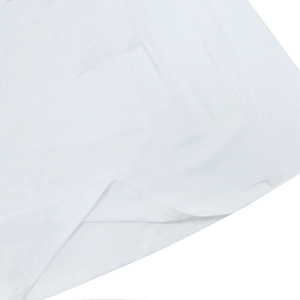 Detail view of white fabric texture with high-quality double stitching on the hemline