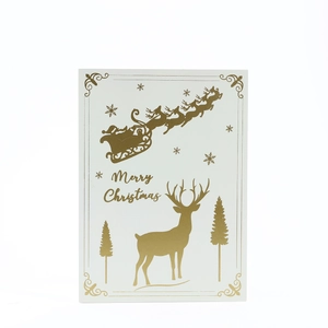 Beige Christmas advent card with gold foil Merry Christmas lettering and reindeer patterns