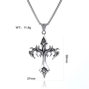 Detailed view of silver gothic cross pendant with flame pattern and size dimensions