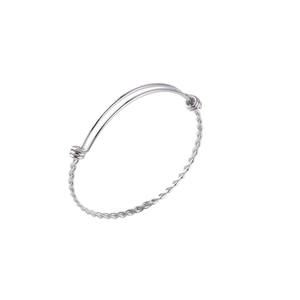 Detailed view of silver adjustable twisted cable bracelet with minimalist metal finish