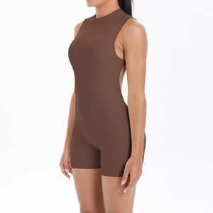 Detail view of the side cutout and stitching on the brown backless athletic romper