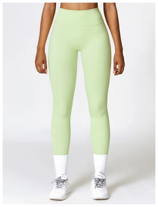 Detailed shot of seamless high-waist fitness leggings in refreshing mint green color