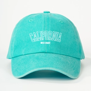 Detailed close-up of teal California West Coast embroidery on cotton twill baseball cap
