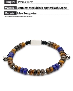 Dettaglio del bracciale con pietre e cordino regolabile, occhio di tigre e acciaio