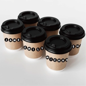 Detail of 0.5 inch round letter stickers used for labeling disposable coffee cups