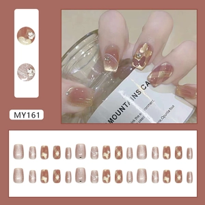 Sparkling champagne gold butterfly cat-eye press-on nails with plaid and rhinestones