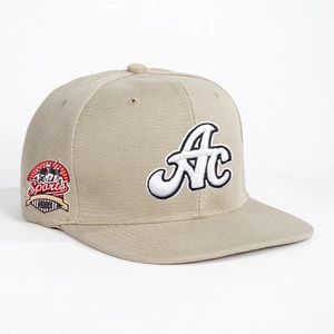 Khaki cotton baseball cap featuring 3D AC embroidery and side sports patch decoration