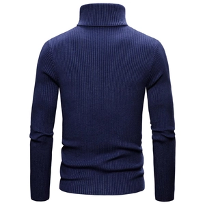 Macro detail of dark blue slim fit turtleneck sweater with fine knit ribbed texture