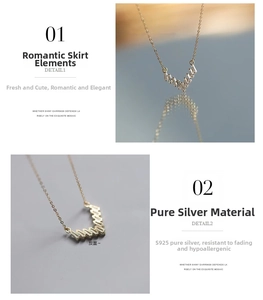 Macro detail of V-shaped 925 silver pendant necklace with shiny trapezoid zirconia stones