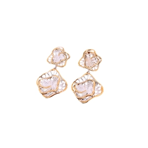 Elegant two-tone gold and silver hollow flower petal earrings with silver needle post