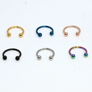 Detailed grid view of 16G stainless steel horseshoe rings in six vibrant metallic colors