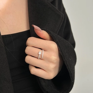 Elegant S925 sterling silver ring featuring a pear-shaped zircon and double row diamond band