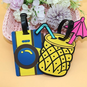 Cartoon PVC luggage tags featuring blue camera and yellow pineapple designs with straps