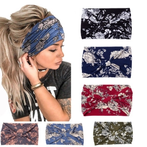 Elastic wide yoga headbands with floral prints shown in seven vibrant color options