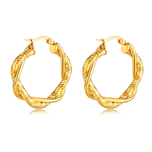 Luxurious gold twisted hoop earrings with textured finish shown on white background