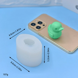 3D duck silicone mold for DIY soap and candles with size measurements on blue background