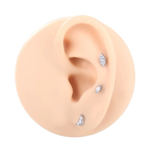 F136 titanium leaf and crescent moon ear piercings set with clear zircon stones