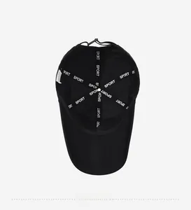 Internal view of black sports baseball cap showing quick-dry mesh and SPORT branding tapes