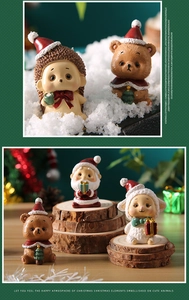 Detailed view of cute Christmas resin miniatures featuring hedgehog and bear in snow