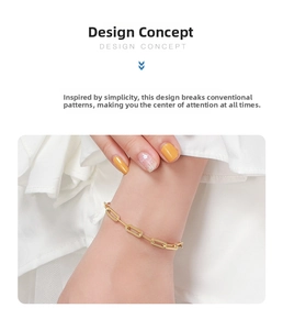 Close-up of minimalist S925 sterling silver paperclip chain bracelet in 14K gold finish