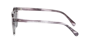 Detail view of transparent purple marble eyeglass frame with E2183 size markings