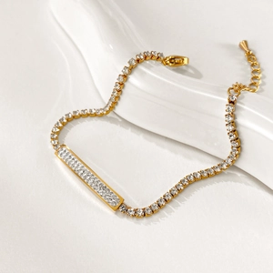 Elegant gold-plated stainless steel bar bracelet with sparkling zircons and adjustable chain