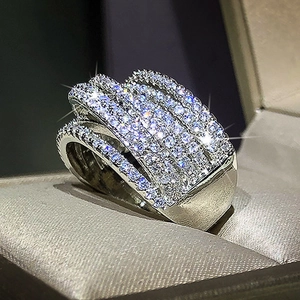 Exaggerated silver multi-layer wide ring with pavé-set white cubic zirconia stones
