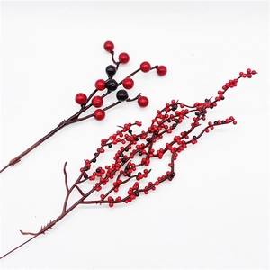 Red and black artificial Christmas berry stems for festive wreaths and tree decoration