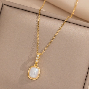 Elegant gold O-chain necklace with square opal pendant and diamond buckle in gift box