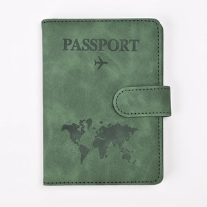 Detail view of dark green PU leather passport cover with RFID blocking and map design