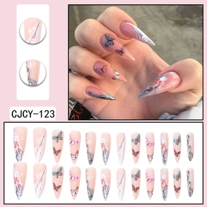 Long stiletto press-on nails with butterfly pattern and marble gradient design