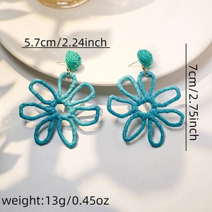 Blue woven raffia flower drop earrings measuring 5.7cm by 7cm weighing 13g total