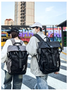 Urban outdoor backpack featuring buckle straps and side mesh pockets for storage