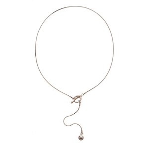 Minimalist silver snake chain necklace with toggle clasp and polished metal bead pendant