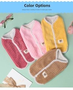 Detail of soft fleece dog vests in pink, yellow, coffee and red with cute bear patches