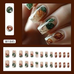 Sparkly autumn leaf press-on nail kit with gold glitter and 24 square-shaped tips