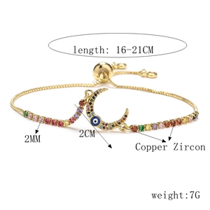 Detail of adjustable evil eye moon bracelet with colorful zircons and gold plating