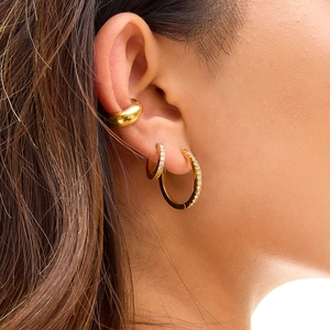 Classic 18K gold plated stainless steel hoop earrings with white diamonds on female ear