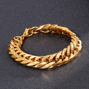 Detailed close-up of 18K gold plated Cuban link bracelet on a sleek dark matte background