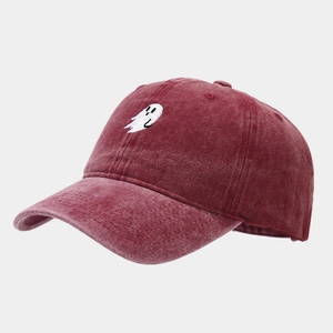Detailed close-up of ghost embroidery on vintage washed burgundy baseball cap