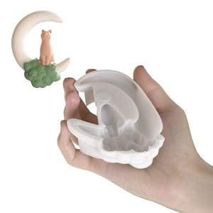 Detail showing the moon cloud cat silicone mold and its finished DIY resin cat craft
